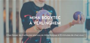Image d'une femme durant une séance de Miha Bodytec, accompagné de la mention suivante : "Miha Bodytec à Wambrechies : les meilleures séances de Miha Bodytec à 10 minutes de chez vous !"